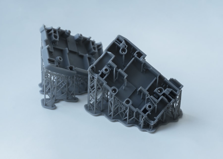 Gray 3D printed mechanical brackets with support structures